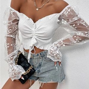 white lace sleeves off the shoulder top